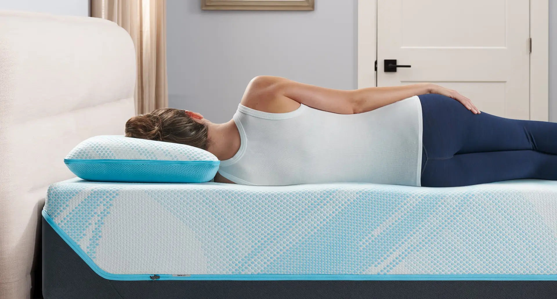 Tempur-Pedic Breeze ProLo Pillow with adjustable height and cooling gel-infused cover for enhanced sleep comfort.