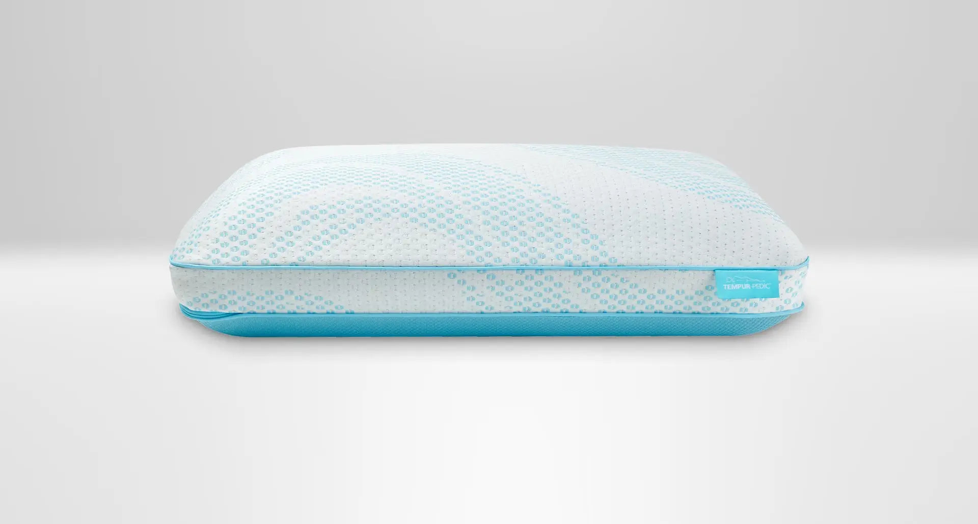 Tempur-Pedic Breeze ProHi Pillow with contoured design and breathable cover for enhanced comfort and support during sleep.