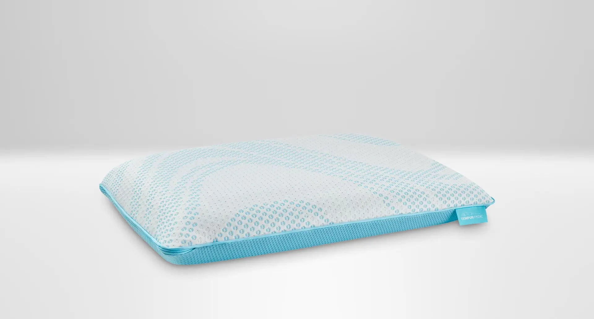 Tempur-Pedic TEMPUR-Breeze ProLo Pillow with ergonomic design and soft fabric cover for comfortable sleep support.