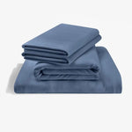 Tempur-Pedic rayon bamboo sheet set in indigo color, soft and breathable bedding with a smooth fabric texture.
