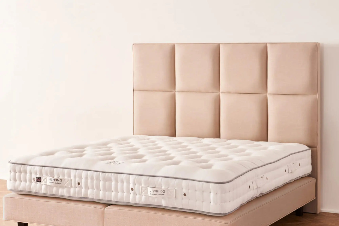 Vispring Atlas headboard in a landscape orientation, showcasing elegant upholstered design and luxurious fabric finish.