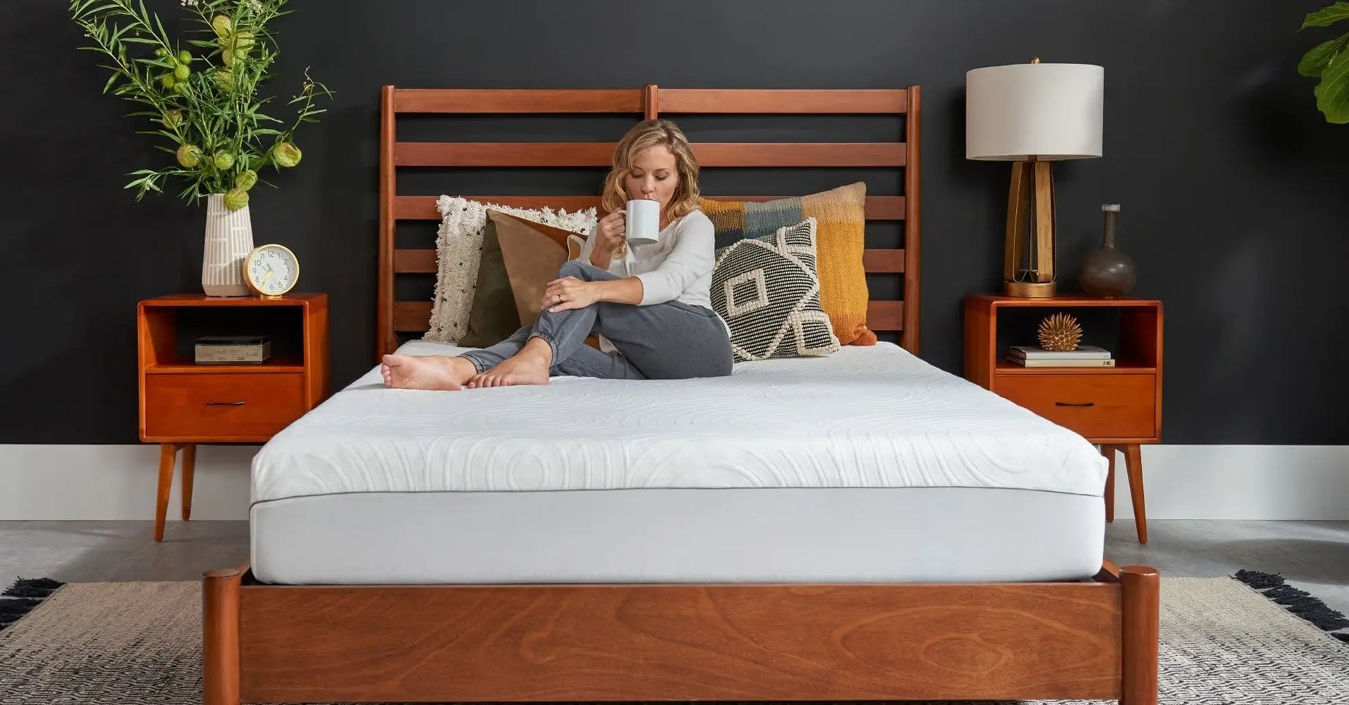 Tempur-Pedic TEMPUR-Protect mattress protector on a bed, showing a soft, fitted fabric cover for protection and comfort.