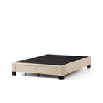 Malouf Duncan platform bed frame with a modern design, shown from a side angle without mattress, featuring a sturdy wooden base.