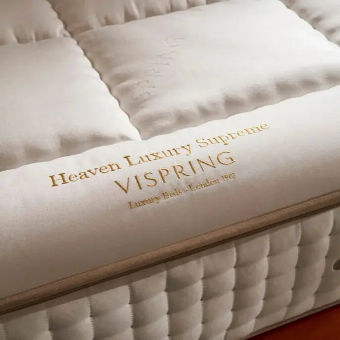 Vispring Heaven Luxury Supreme Topper showing plush, quilted surface with high-quality fabric and luxurious stitching details.