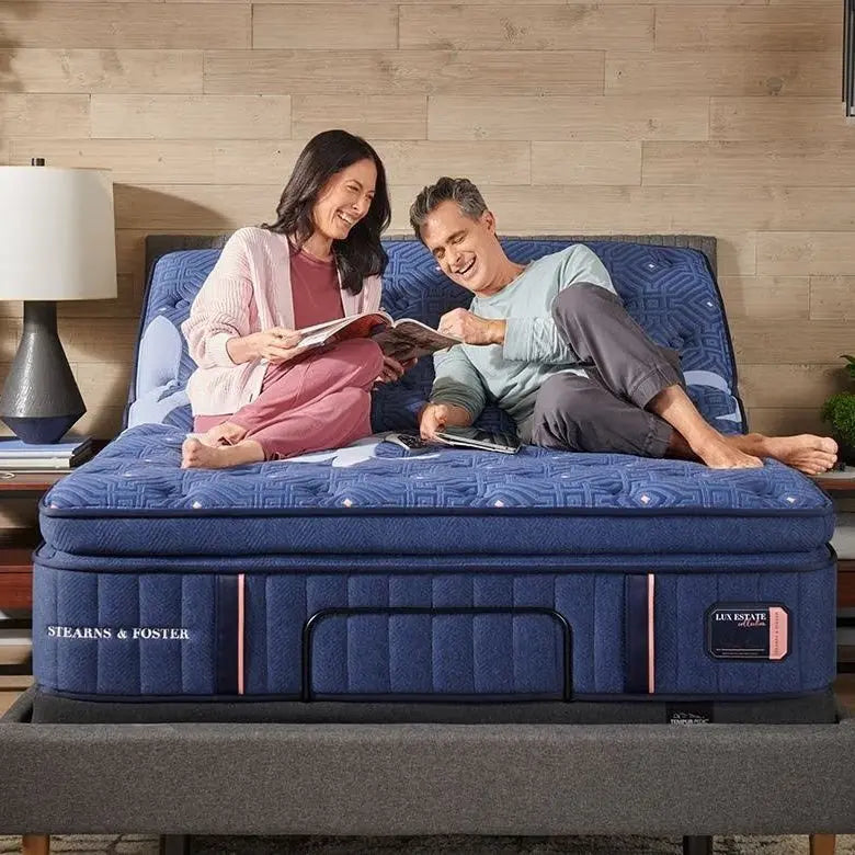 Stearns & Foster Lux Estate mattress with plush top and detailed quilting, shown in a modern bedroom setting.
