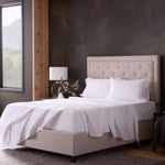 Malouf classic cotton sheet set with white fitted and flat sheets, smooth and soft fabric for comfortable sleep.