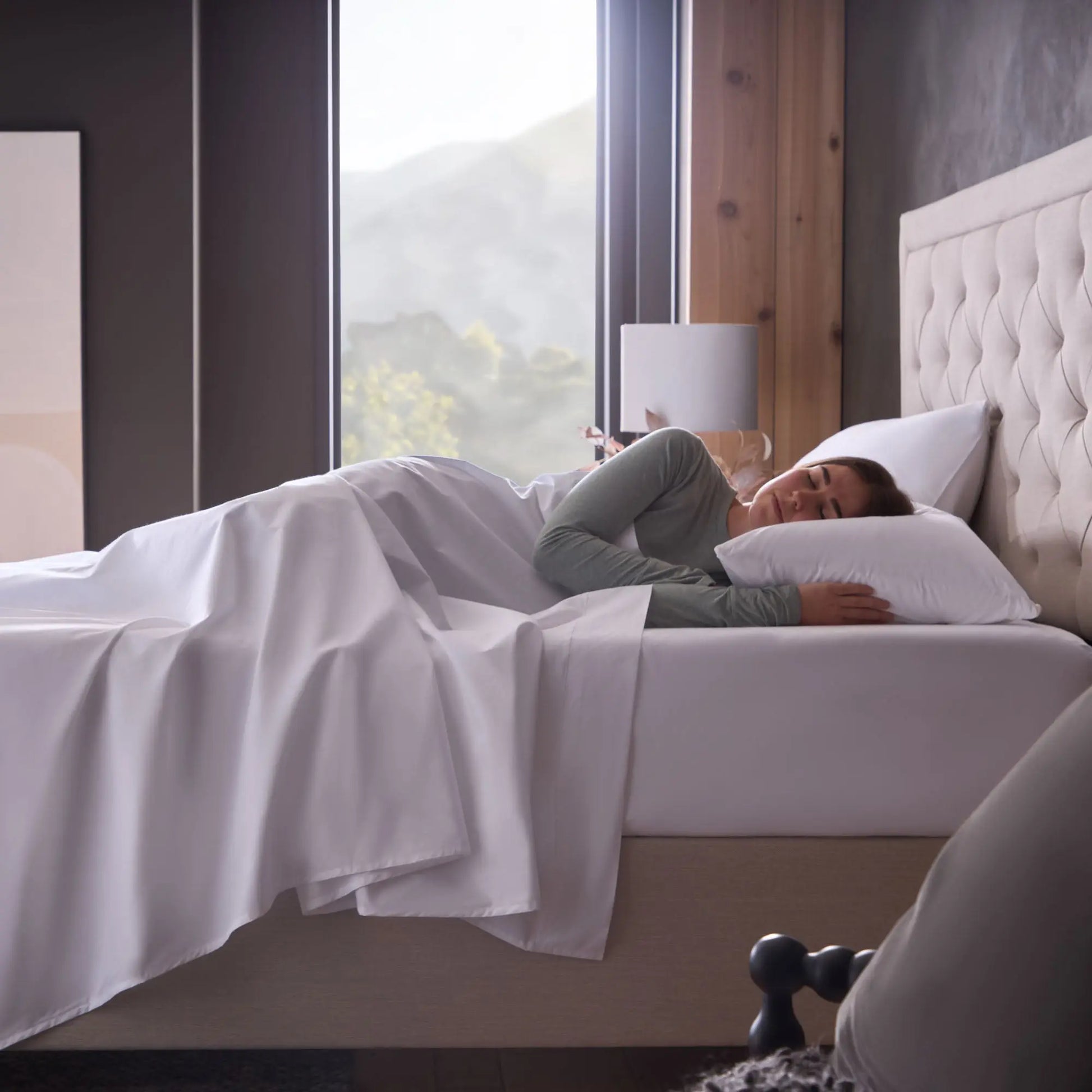 Malouf classic cotton sheet set with white fitted and flat sheets, showcasing smooth, soft fabric and crisp, clean appearance.