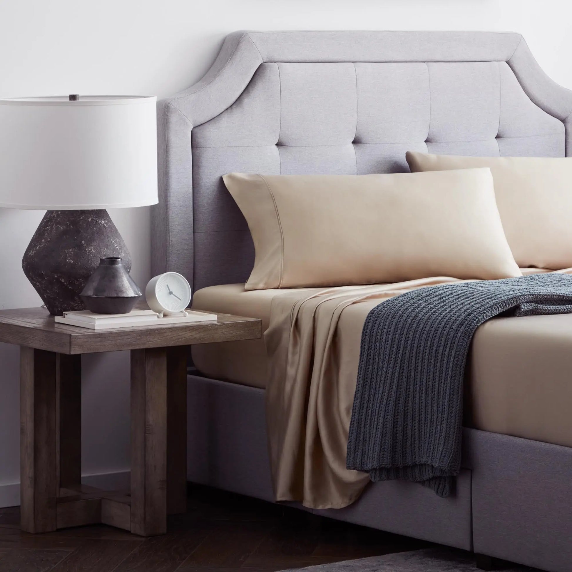 Ecru botanical sheet set made with Malouf TENCEL Lyocell fiber, featuring soft, breathable fabric and botanical-inspired design.