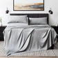 Malouf botanical sheet set made with TENCEL Lyocell fiber, featuring smooth, breathable fabric in a neatly arranged bed.