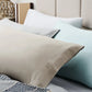 Malouf smooth bamboo rayon sheet set with soft, breathable fabric displayed on a neatly made bed.