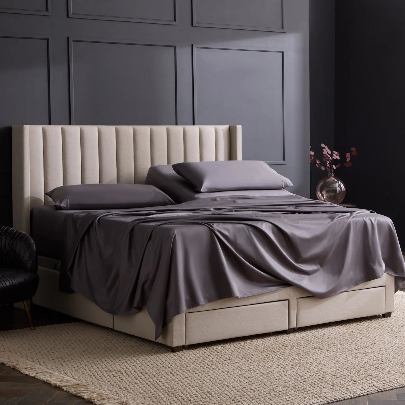 Malouf Natural Supima Cotton sheet set with neatly folded white sheets on a bed, highlighting soft, high-quality bedding.
