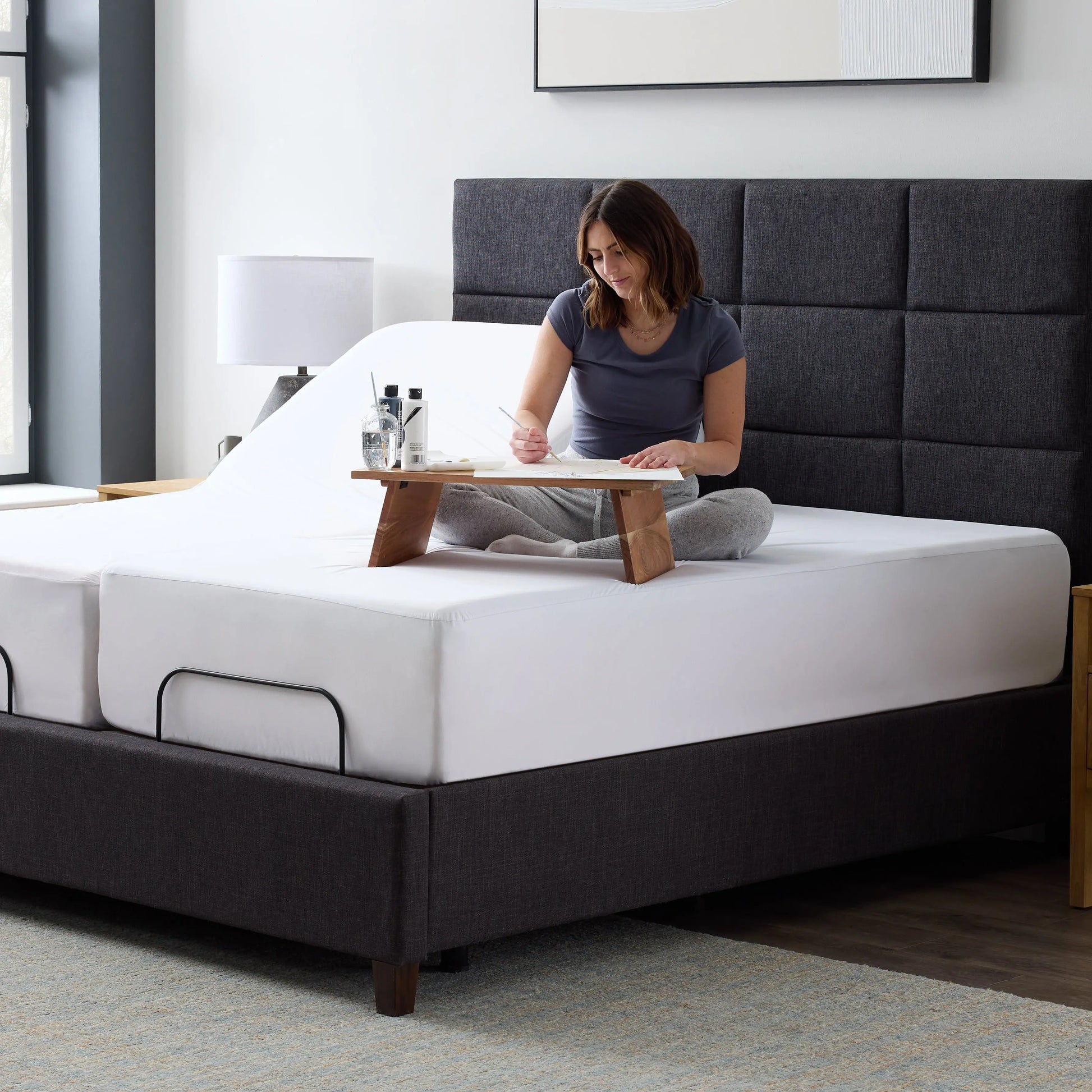 Malouf Five Sided and OmniPhase mattress protector showing secure fitted edges and breathable fabric for full protection.