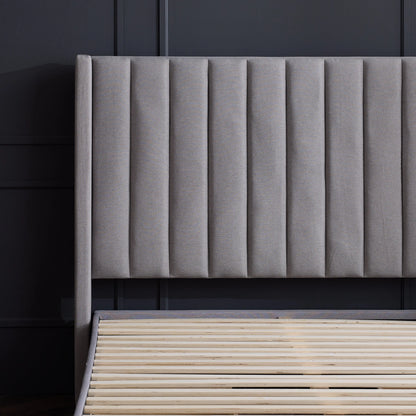 Blackwell headboard by Malouf featuring a sleek, modern design in black fabric with button-tufted details.