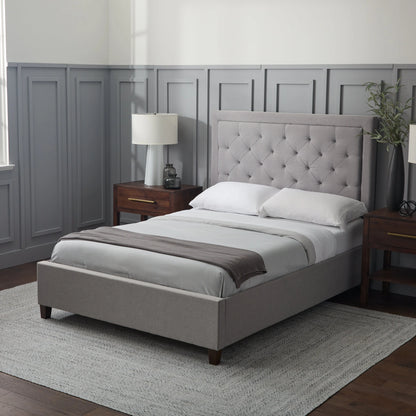 Malouf Eastman platform bed frame with a sleek, modern design and sturdy construction, shown with a headboard panel in the image.
