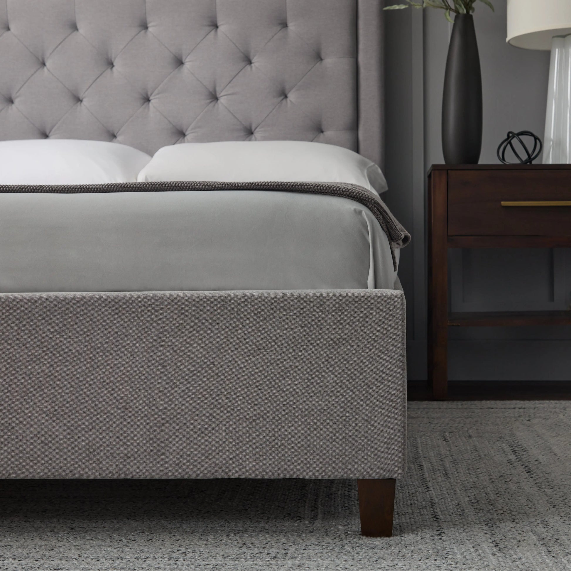 Malouf Eastman platform bed frame with a sleek, modern design and straight web panel headboard for a stylish bedroom setup.