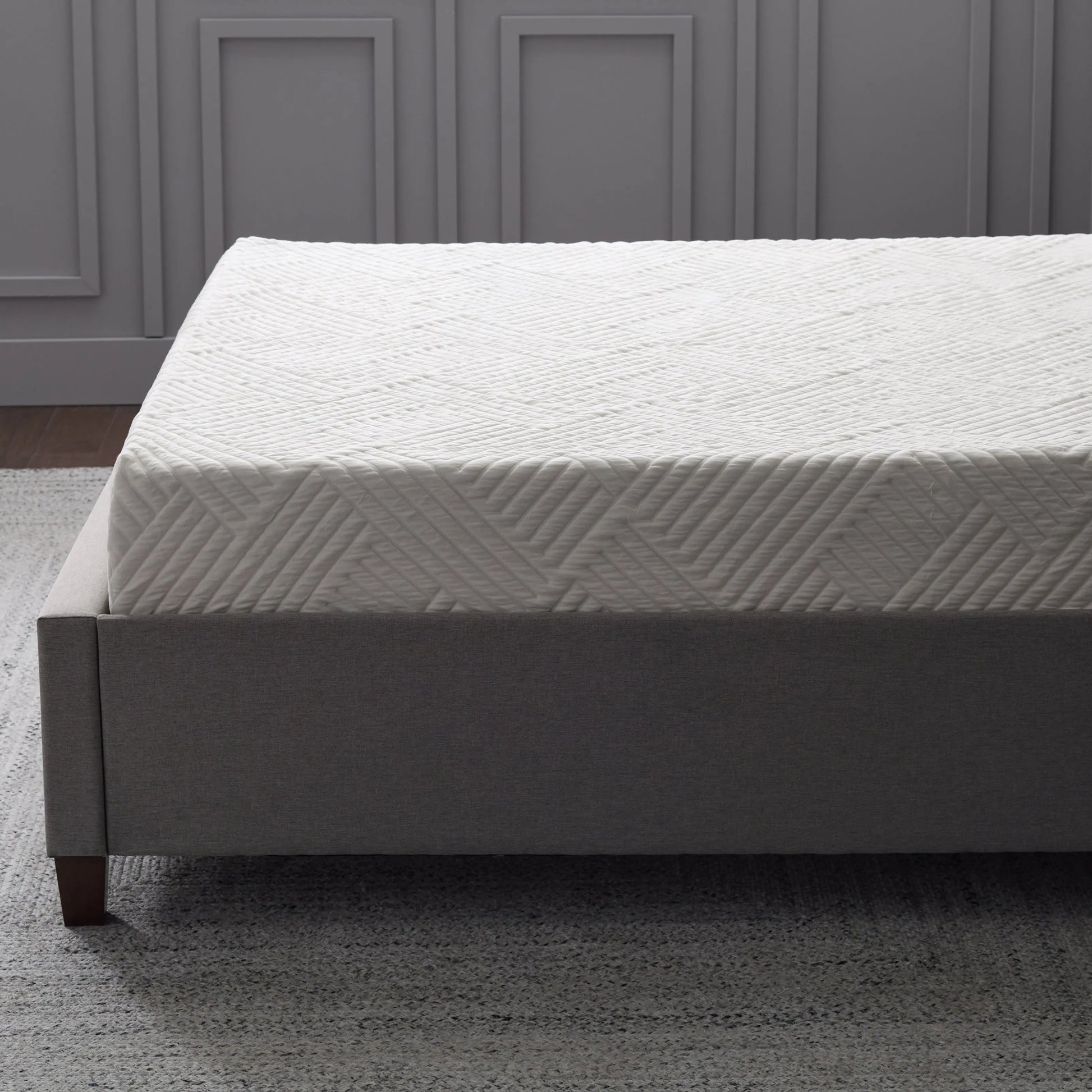 Malouf Eastman platform bed frame with sleek design and sturdy construction, shown in natural wood finish.