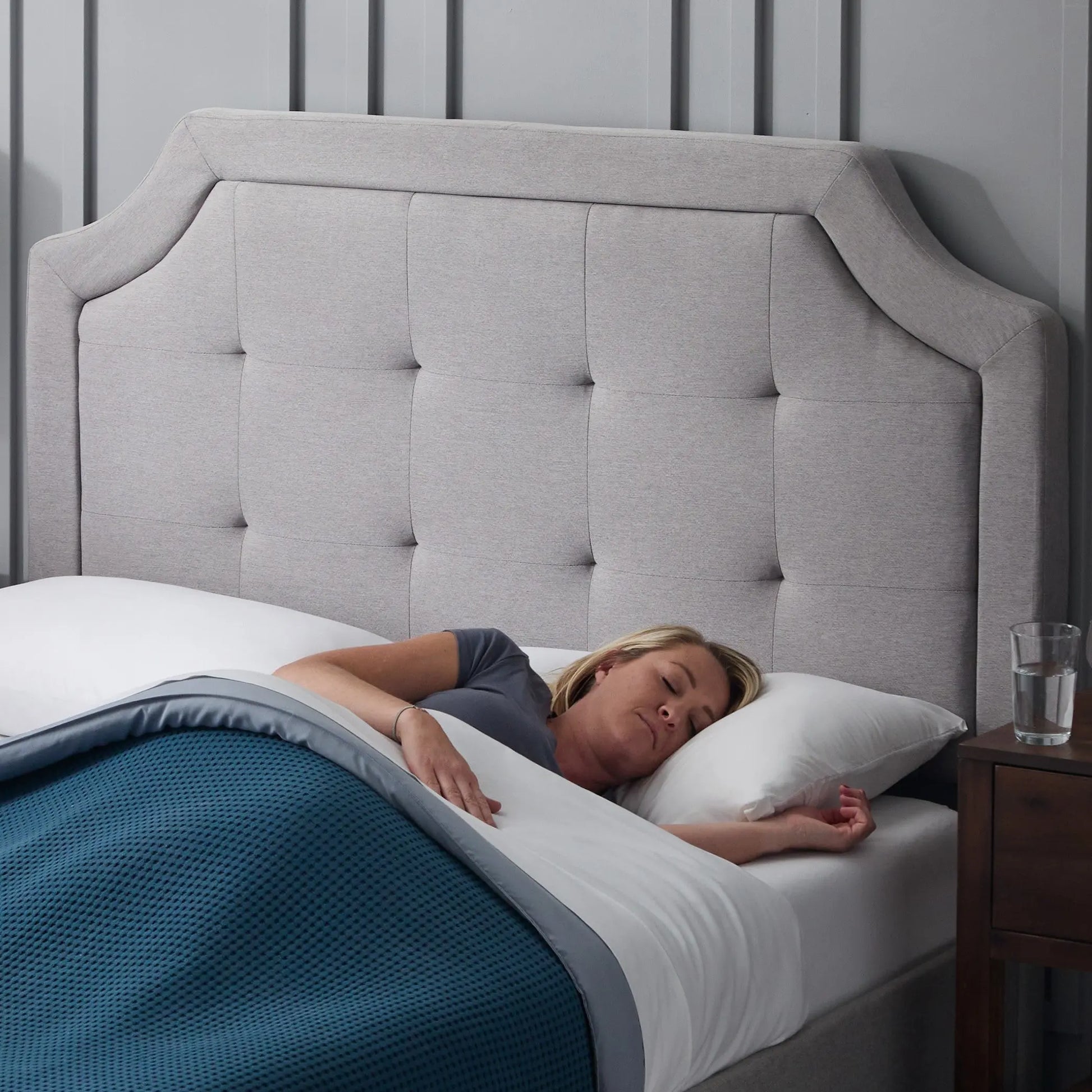 Malouf Carlisle headboard with padded fabric upholstery and modern design, shown in a wide view.