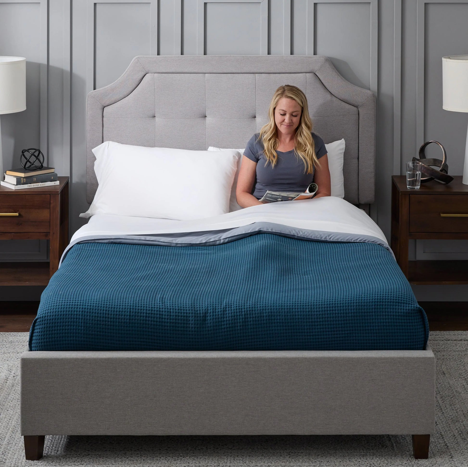 Malouf Carlisle headboard with a sleek, modern design in a neutral fabric, shown in a straight-on view.