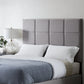 Malouf Scoresby headboard in neutral fabric with plush padding and wooden legs, designed for modern bedroom decor.