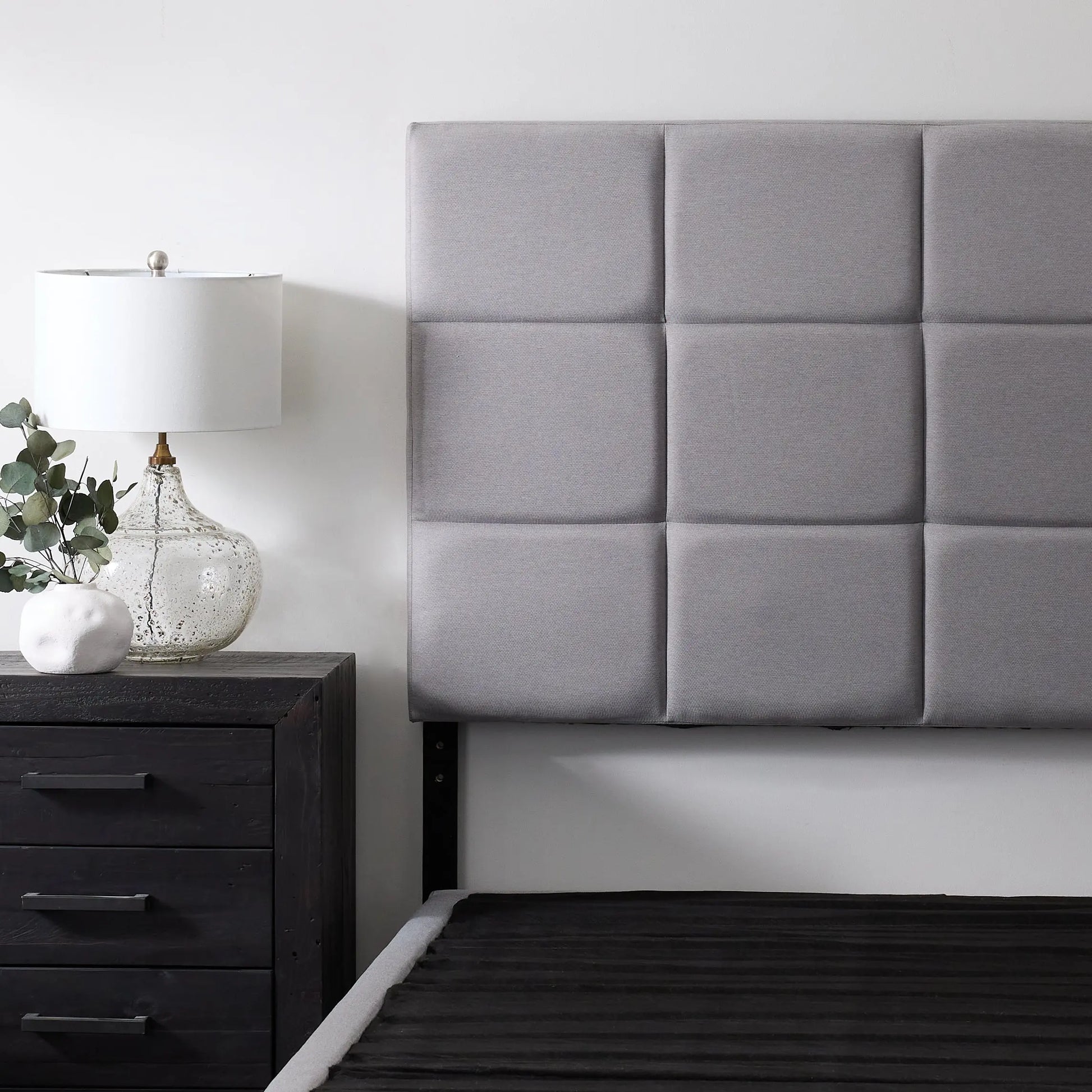 Malouf Scoresby headboard in neutral fabric with a sleek, modern design, shown in a straight view.