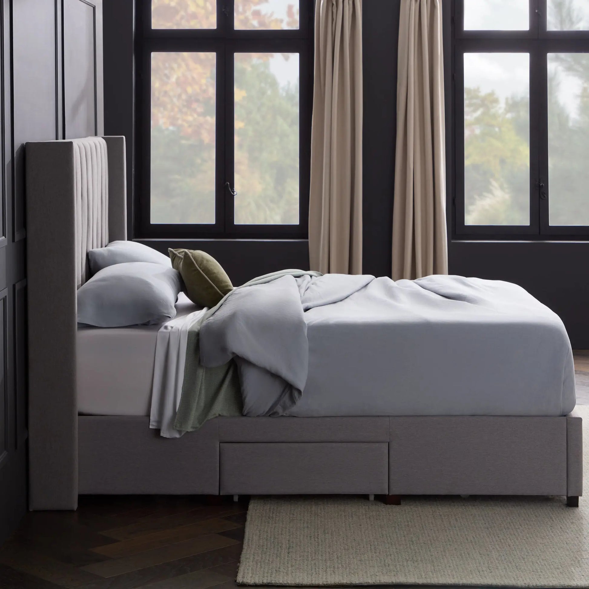Malouf Watson platform bed frame in natural wood finish with sleek headboard and sturdy legs, modern bedroom furniture.