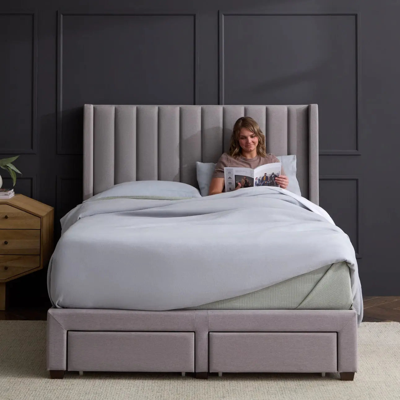 Malouf Watson platform bed frame with a sleek, modern design and sturdy wooden slats, shown in a straight profile view.