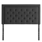 Malouf Hennessy headboard in charcoal fabric, featuring a modern design with padded upholstery and sturdy wooden legs.