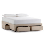 Malouf Watson platform bed frame with built-in drawers, shown in a modern bedroom setting with a sleek design and neutral bedding.