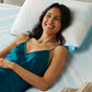 Tempur-Pedic Breeze ProLo Pillow shown in a lifestyle setting with ergonomic design and breathable fabric for comfortable sleep.