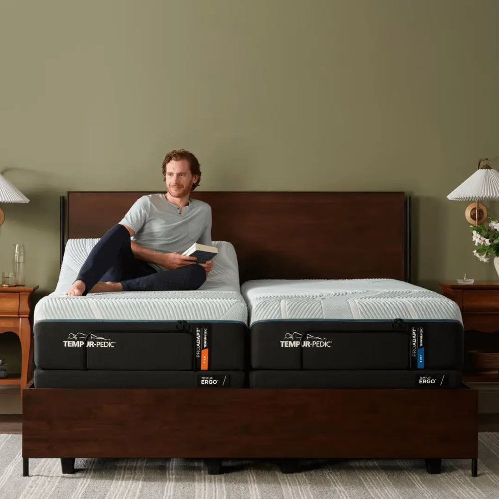 TEMPUR-ProAdapt split mattress with one side raised and a person reclining