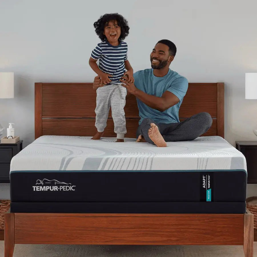 Tempur-Pedic TEMPUR-Adapt medium firmness queen mattress with ergonomic lifestyle setting and plush surface.