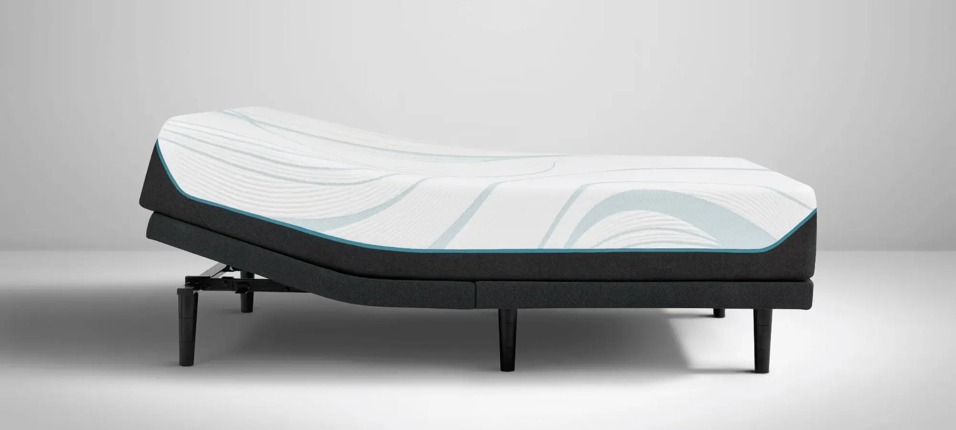 Tempur-Pedic TEMPUR-Adapt medium queen-sized mattress with ergonomic profile and plush surface, showcasing its comfort and support features.