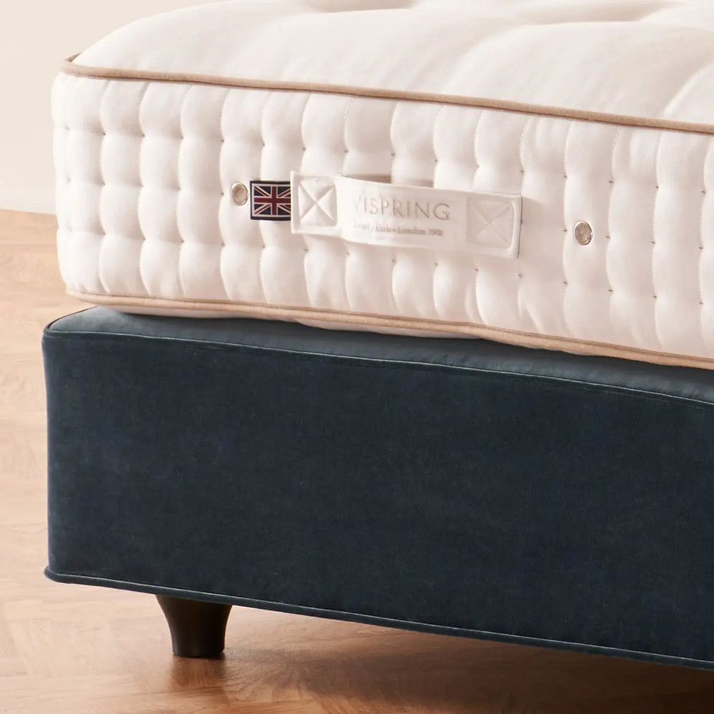 Vispring Tiara Superb mattress border on an upholstered base