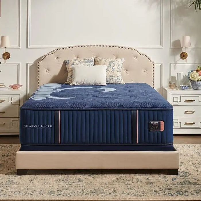 Stearns & Foster Reserve mattress on an upholstered bed, front view