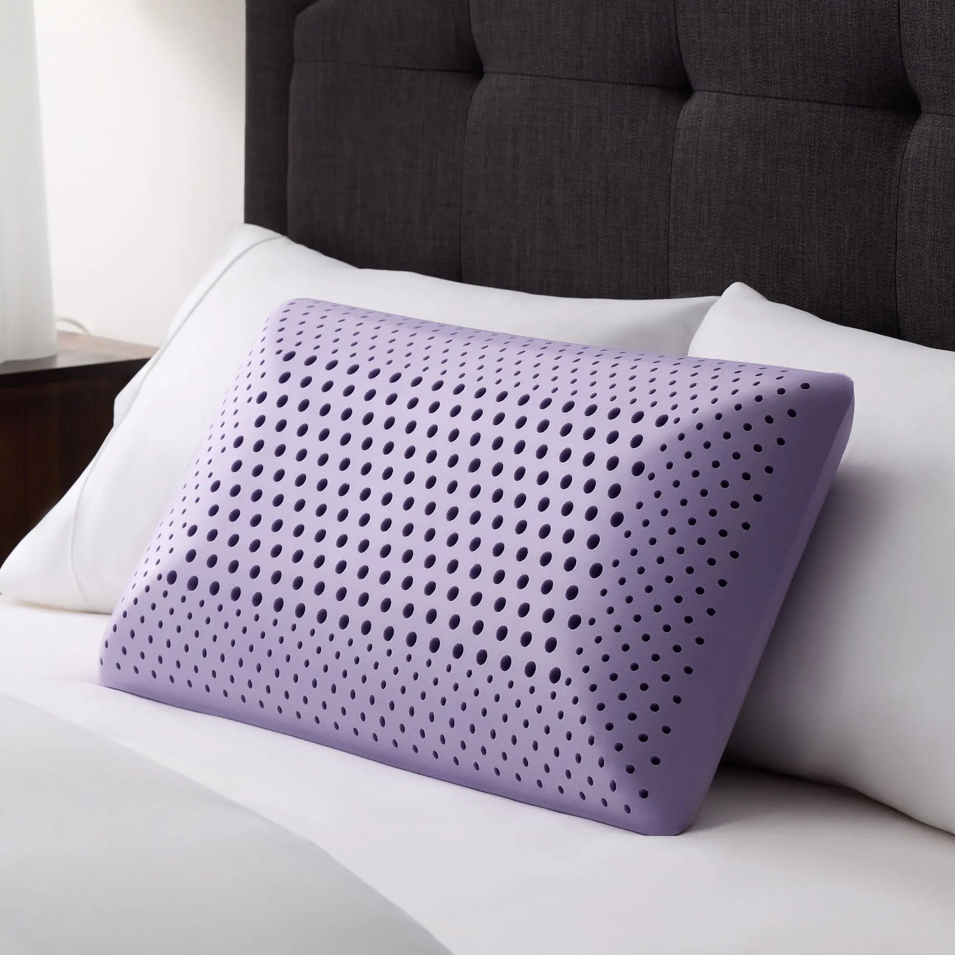 Lavender Zoned ActiveDough Pillow by Malouf showing its ergonomic shape and soft fabric cover for comfortable sleep support.
