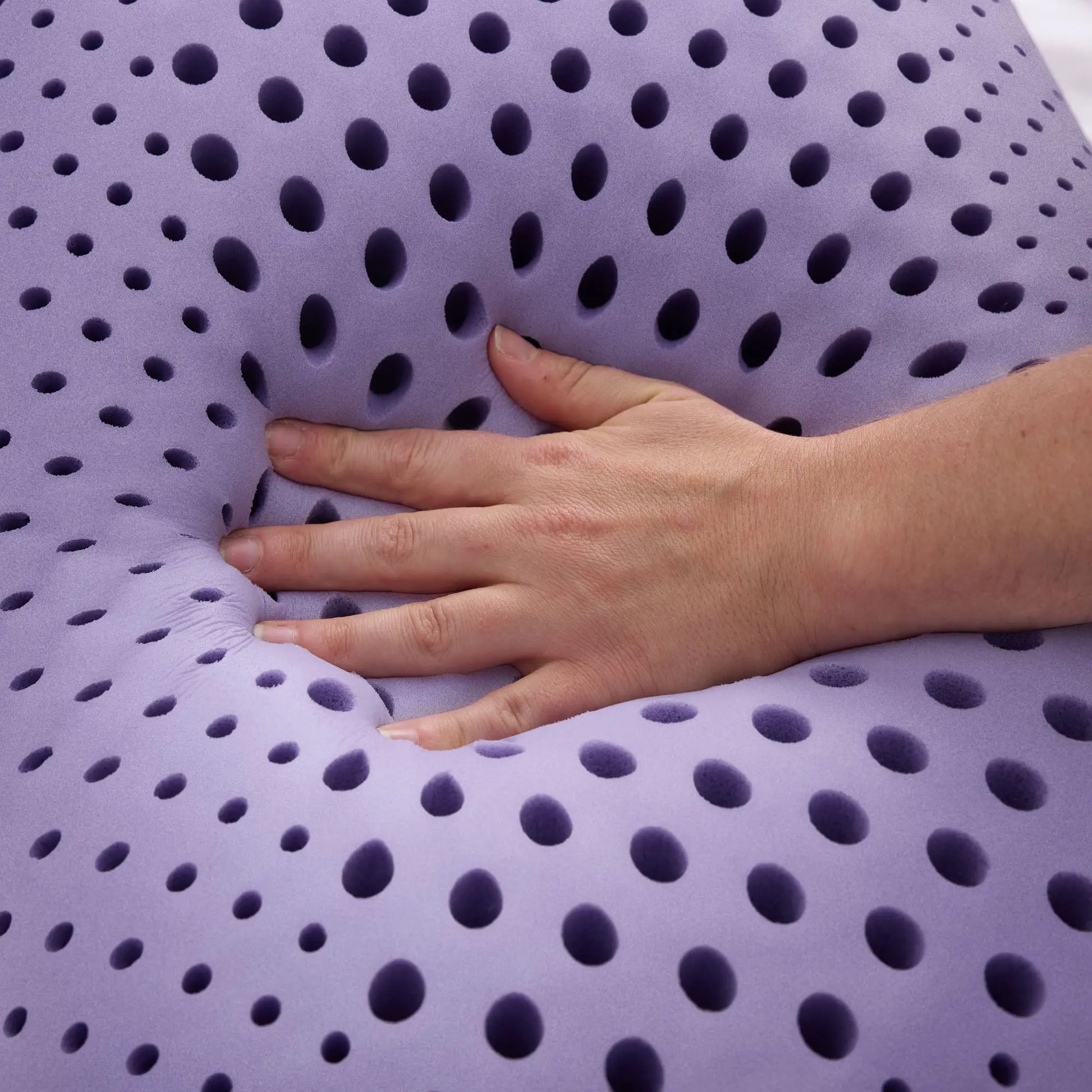 Malouf Zoned ActiveDough Lavender Pillow with hand-stitched detailing, showcasing its plush, supportive design and lavender fabric.