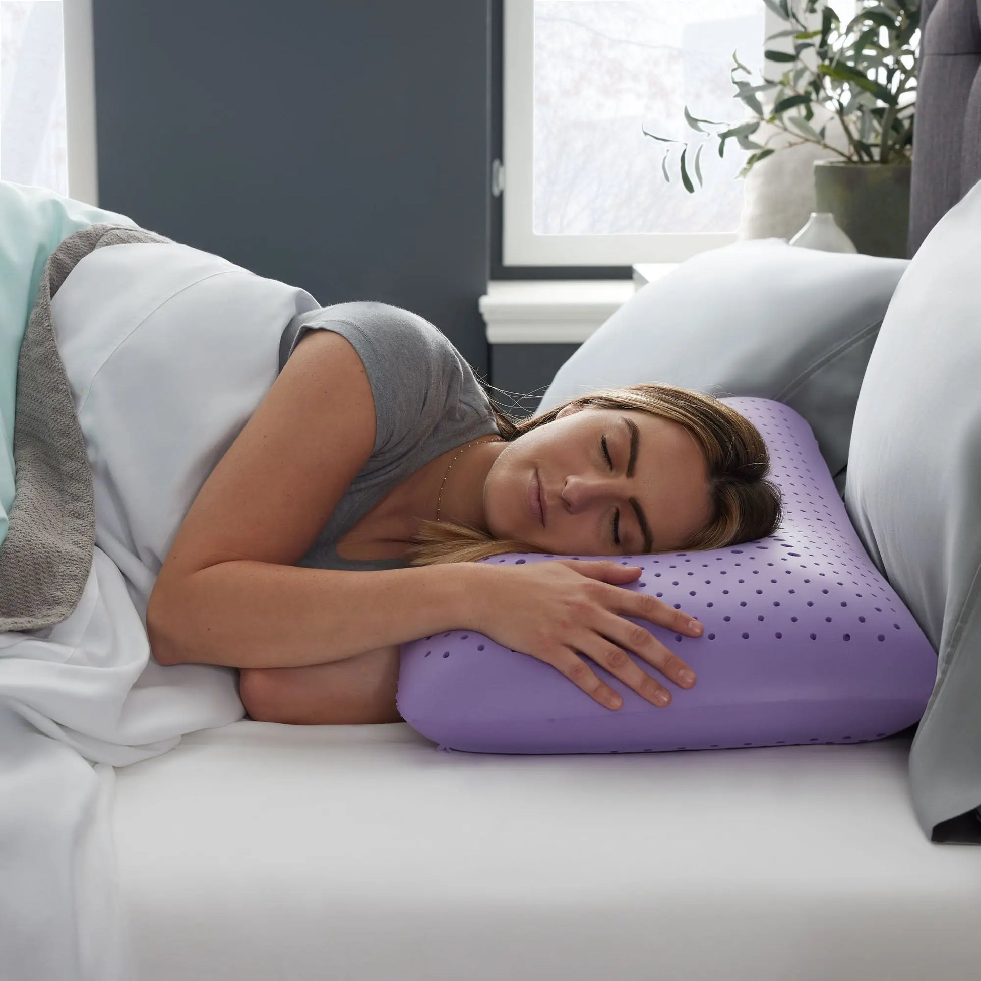 Malouf Shoulder Zoned Dough Pillow with lavender scent, showing the side view and zoned support design for improved comfort.