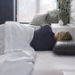 Malouf Shoulder Zoned Dough Pillow with bamboo charcoal cover, showing side profile and ergonomic design for neck support.