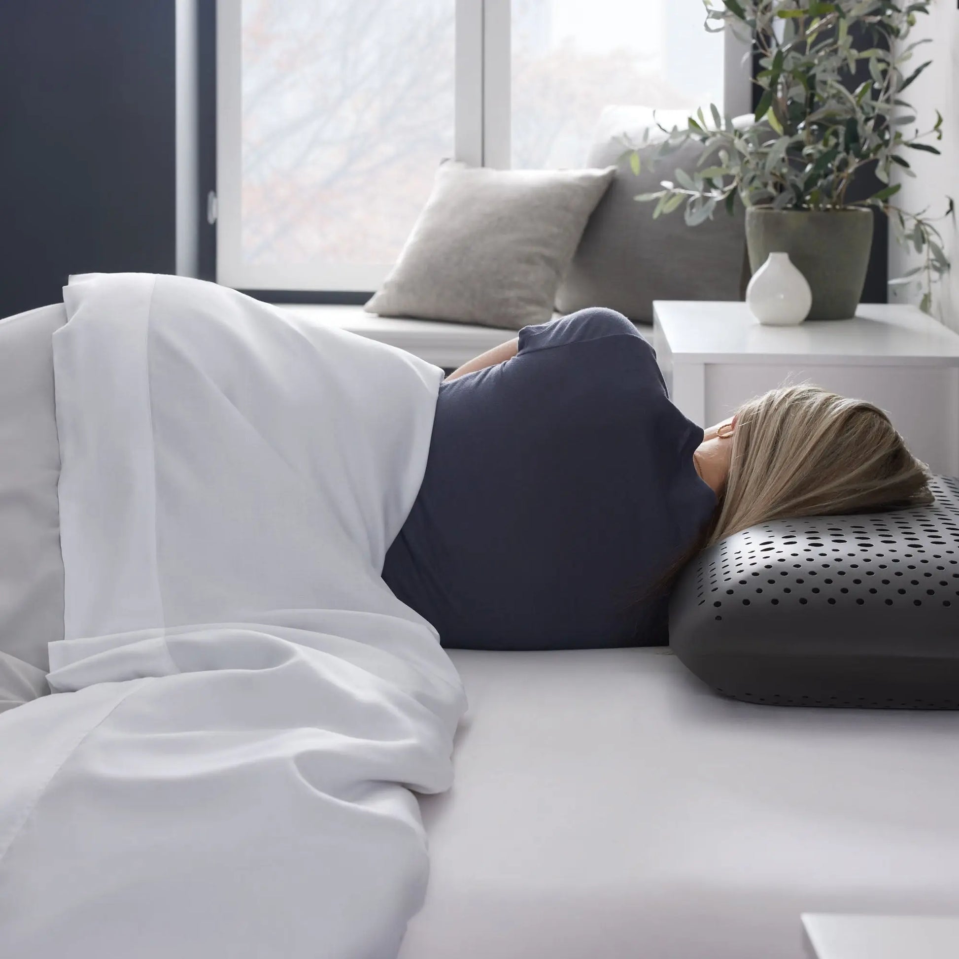 Malouf Shoulder Zoned Dough Pillow with bamboo charcoal cover, showing side profile and ergonomic design for neck support.