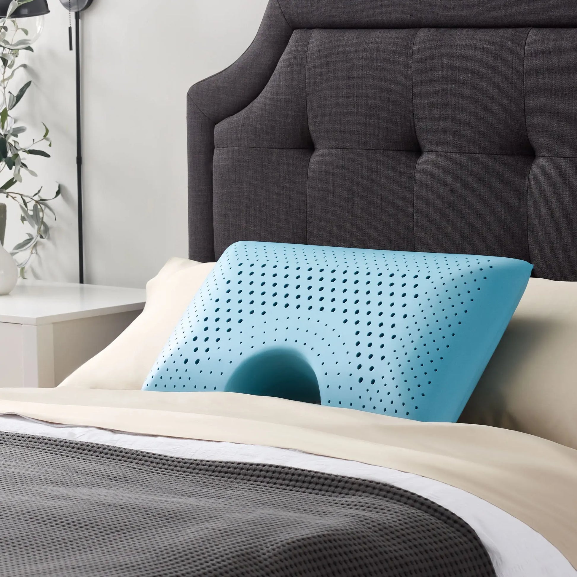 Malouf Shoulder Zoned Dough Pillow showing its ergonomic design and plush surface for comfortable neck and shoulder support.