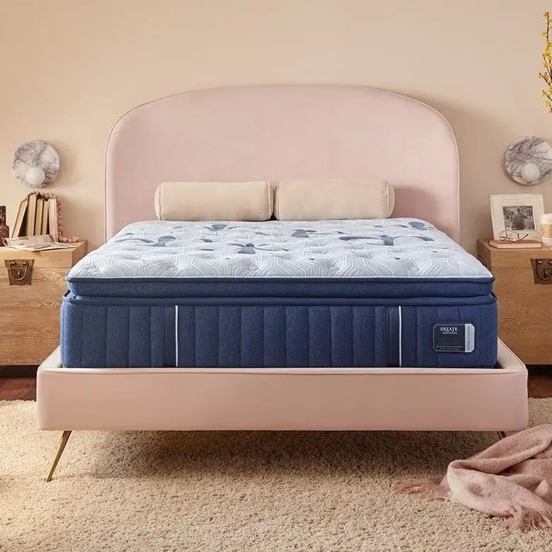 Luxury Stearns & Foster Estate mattress with plush quilted surface and supportive design, showcasing a neatly made bed with elegant bedding.