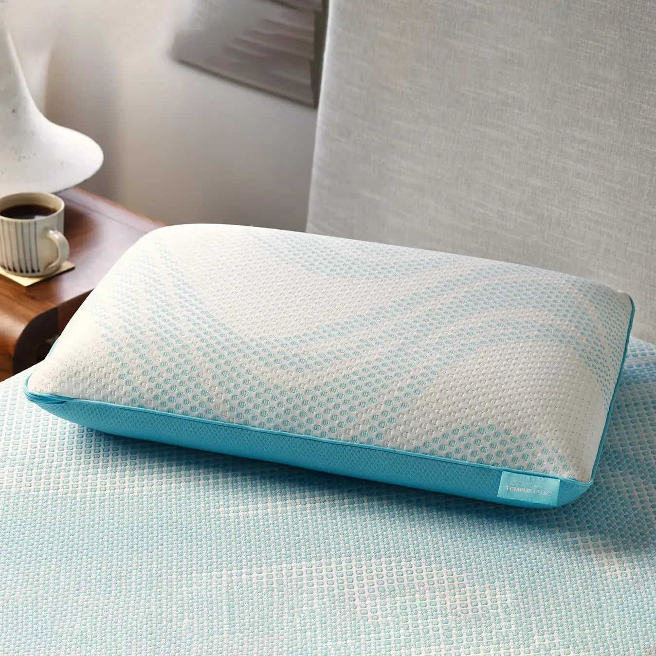 Tempur-Pedic Breeze ProLo Pillow showing its ergonomic design and soft, breathable fabric for enhanced sleep comfort.