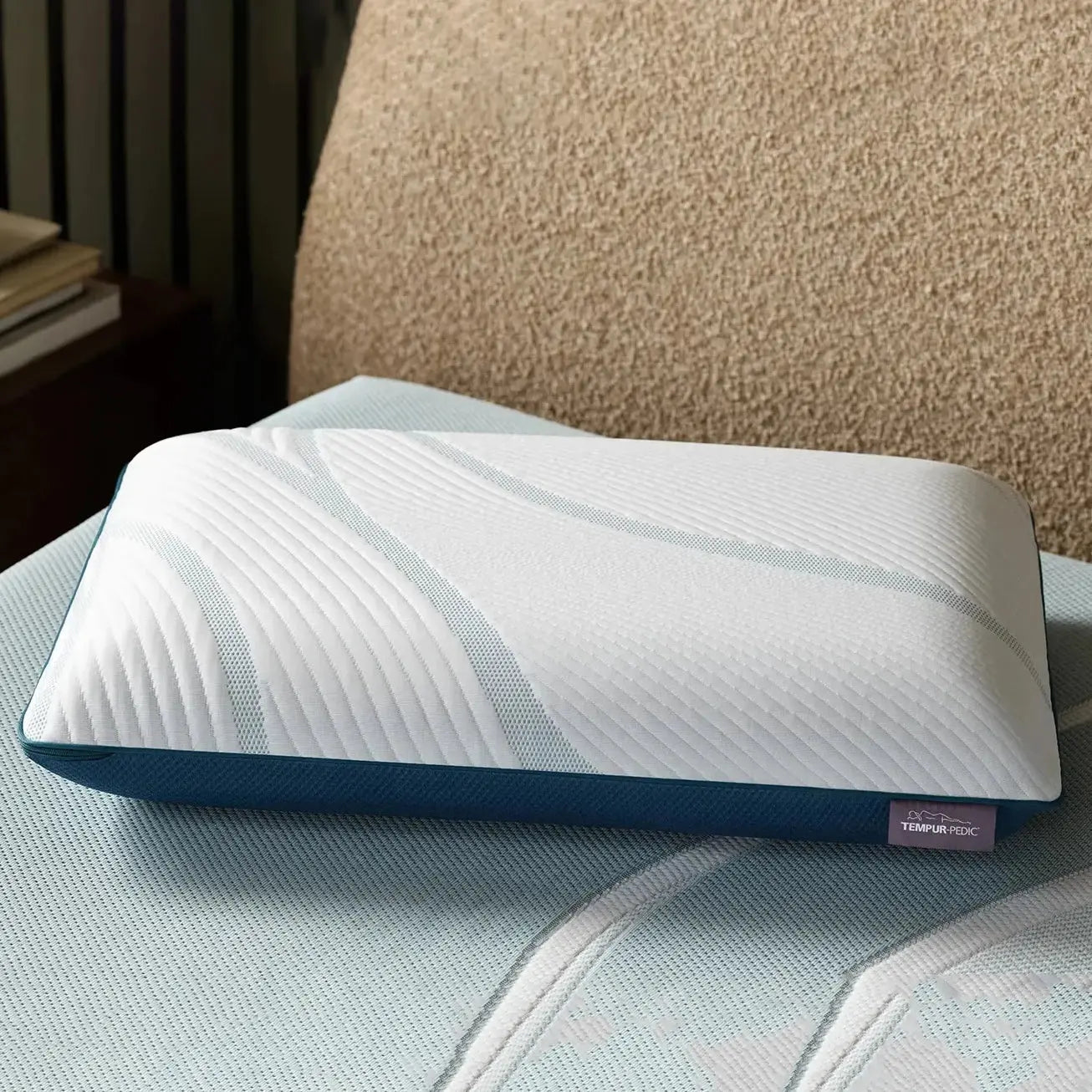 Tempur-Pedic TEMPUR-Adapt ProLo Pillow showing a contoured memory foam pillow with adjustable support and soft white cover.