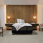Aireloom Luxetop M2 Luxury Firm mattress with plush, quilted surface and supportive structure, shown in an undressed, full view.