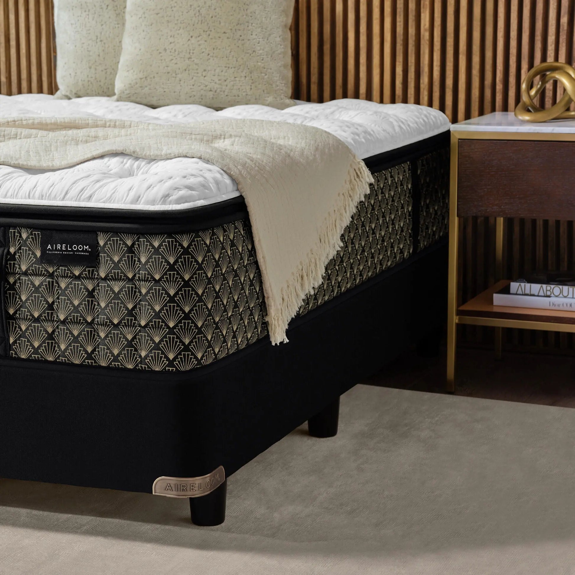 Aireloom Luxetop M2 Luxury Firm mattress detail showing plush fabric and premium stitching for secure and comfortable sleep support.