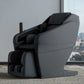 Panasonic MAN2 black massage chair on a white background